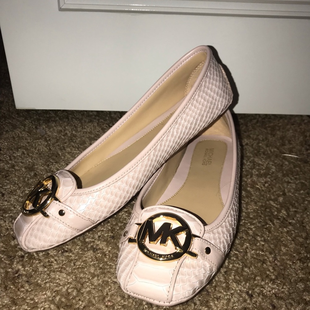 Michael Kors pink snakeskin flats